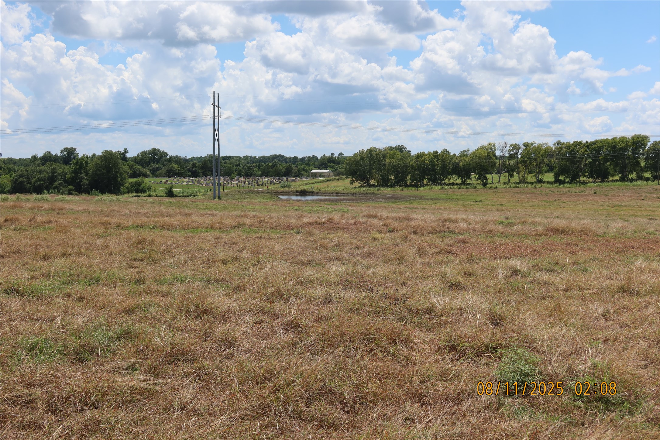 0 Sempronius Road Chappell Hill, TX 77426 - Photo 21 of 25 a view of a lake with houses in the back