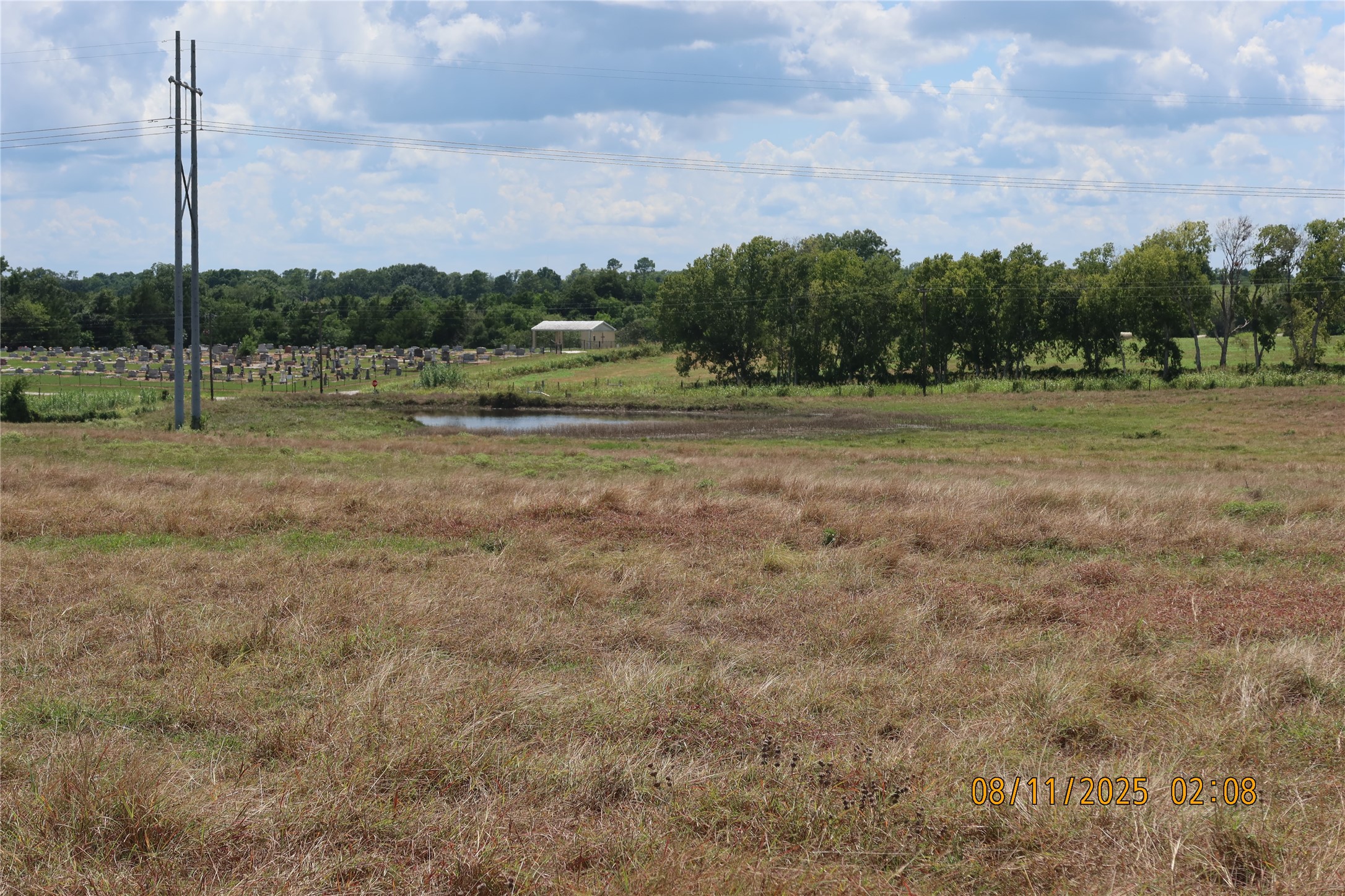 0 Sempronius Road Chappell Hill, TX 77426 - Photo 22 of 25 a view of a green field with wooden fence