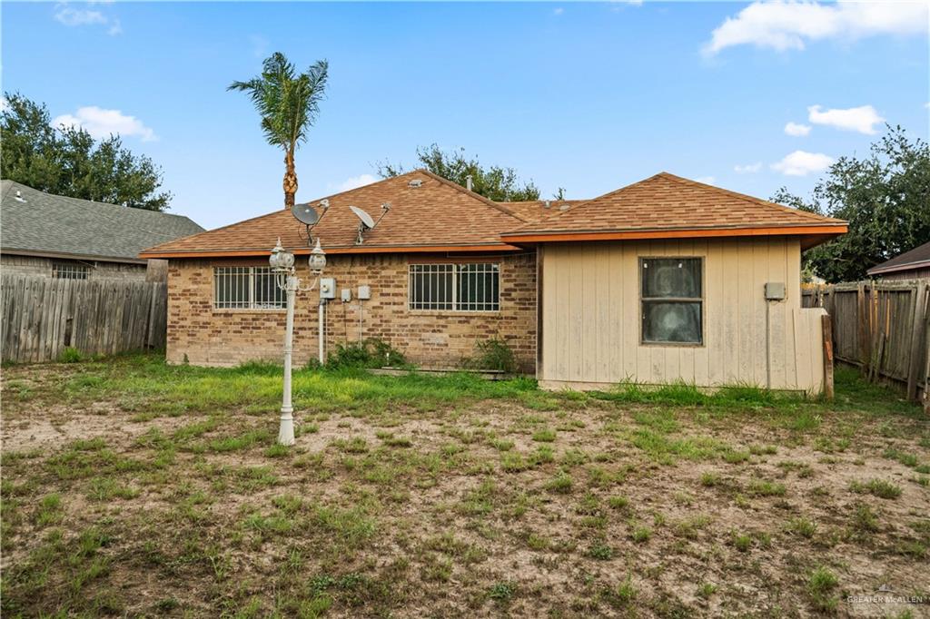 6402 South Mars Lane Pharr, TX 78577 - Photo 15 of 17 a house with trees in the background