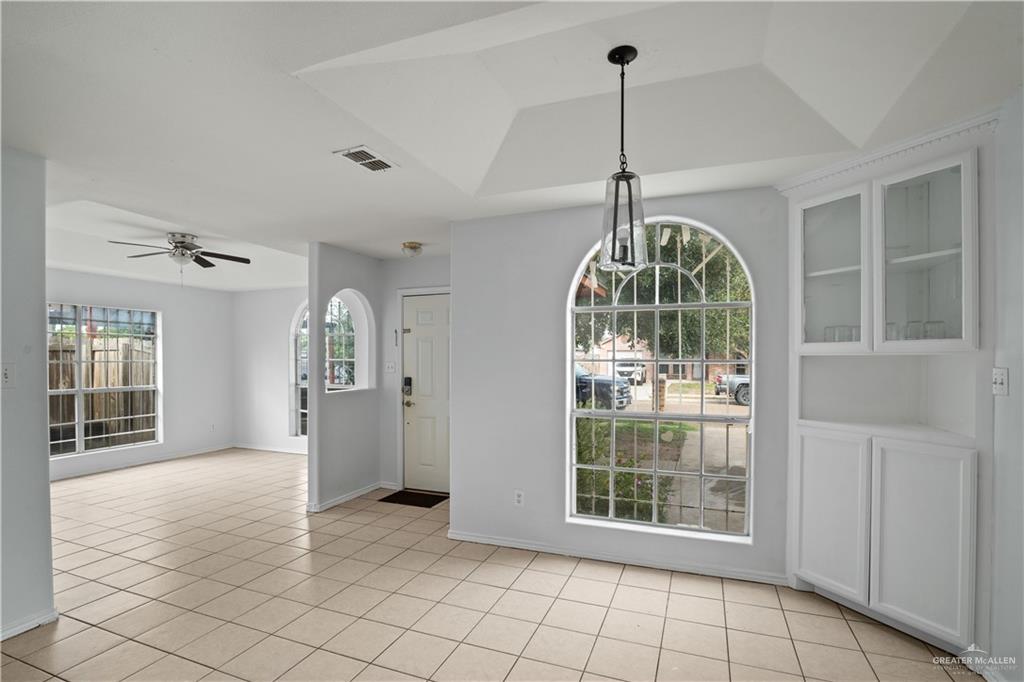 6402 South Mars Lane Pharr, TX 78577 - Photo 5 of 17 a view of empty room with windows