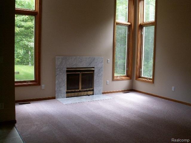 2589 Fisk Road Howell, MI 48843 - Photo 4 of 9 Great Room w/fireplace