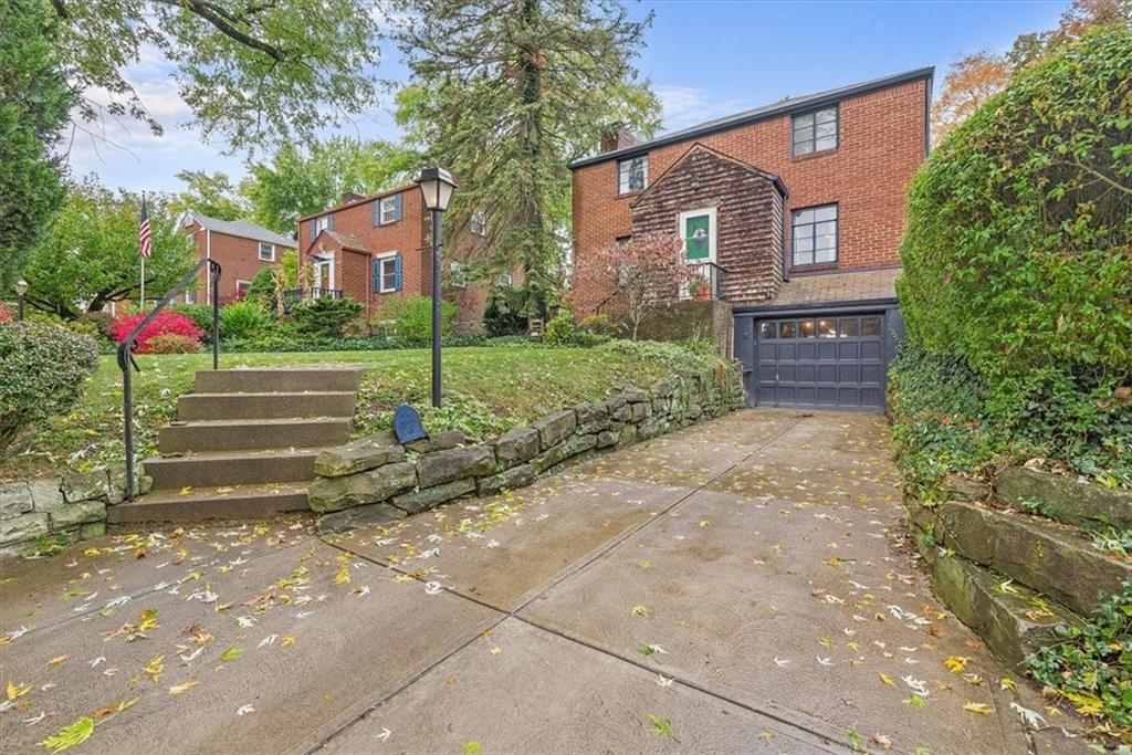 2026 Brookfield Road Pittsburgh, PA 15243 - Photo 2 of 25 a view of a house with a small yard and large tree
