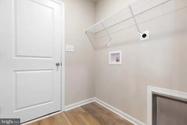 a view of a hallway with closet
