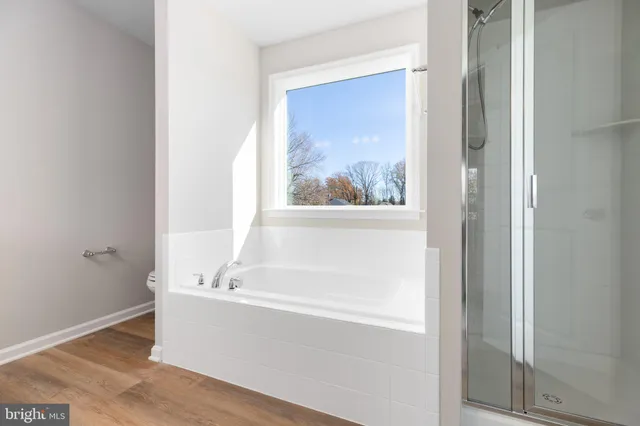 a view of a bathtub in a bathroom