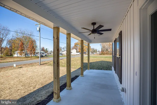 a view of a porch and garden