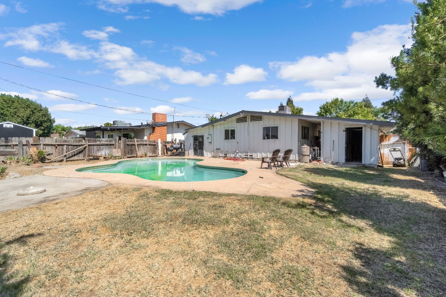 835 I Street Parlier, CA 93648 - Photo 27 of 27 a view of a house with a yard