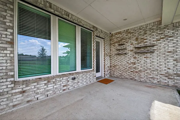a view of a golf course with a lake