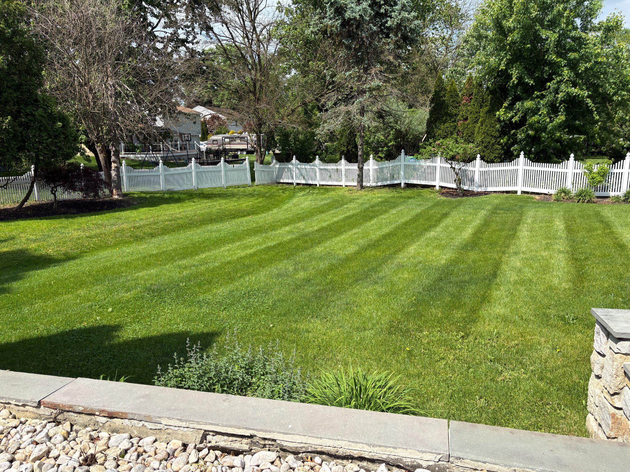 1021 Meetinghouse Road Ambler, PA 19002 - Photo 11 of 41 Lush green lawn with elegant fencing.