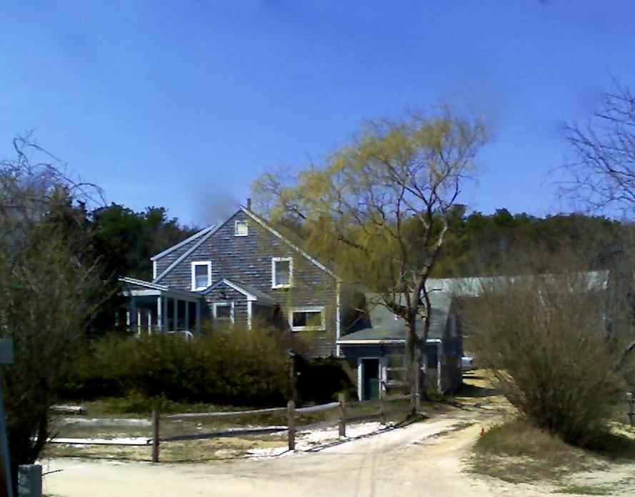 9 Francis Road Truro, MA 02666 - Photo 32 of 34 a front view of a house with a yard