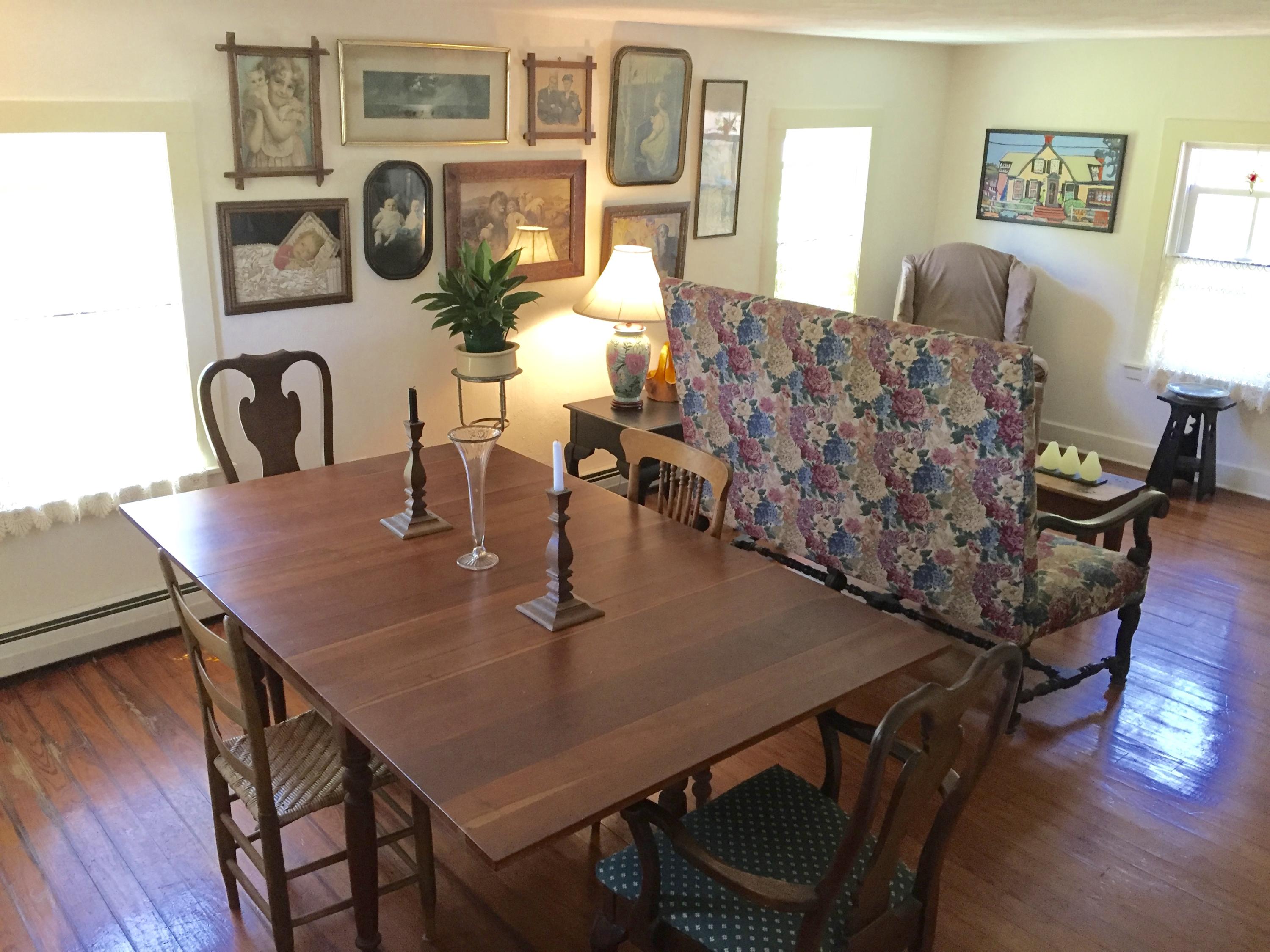 9 Francis Road Truro, MA 02666 - Photo 6 of 34 a view of a dining room with furniture and wooden floor