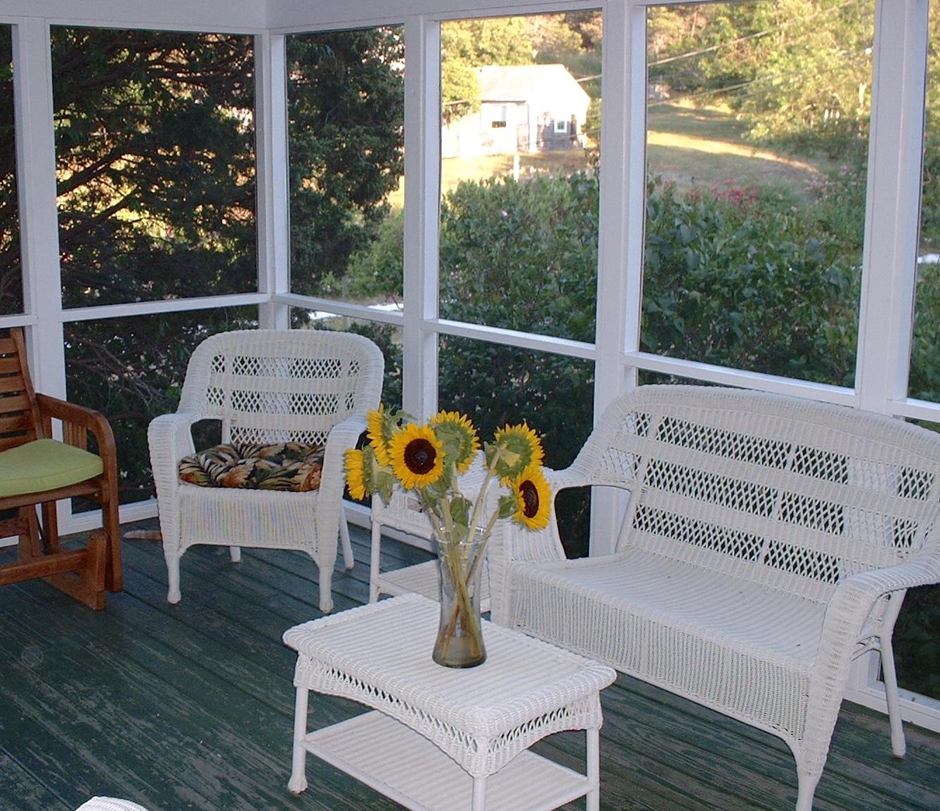 9 Francis Road Truro, MA 02666 - Photo 9 of 34 a bedroom with a bed a table and chairs