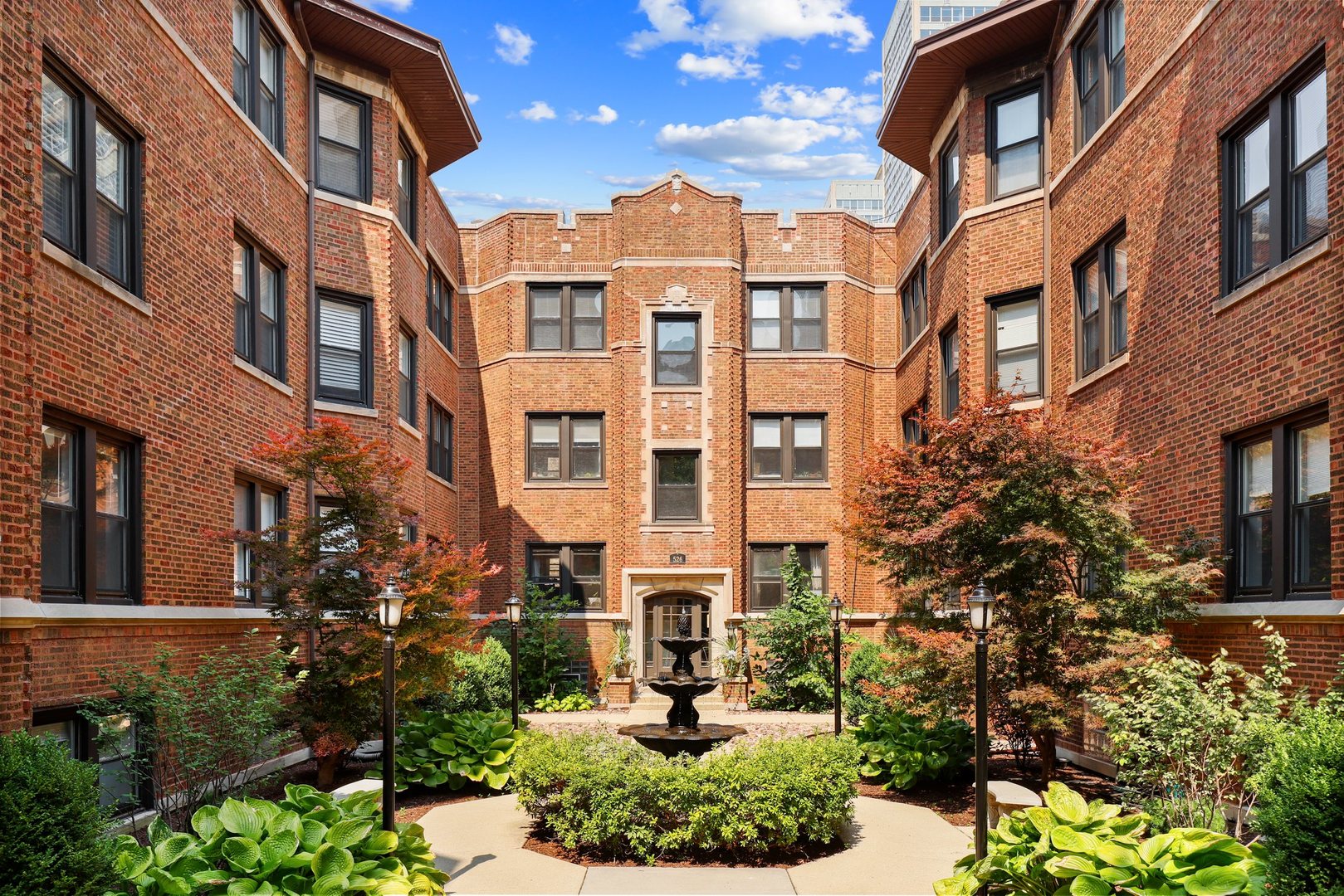 528 West Cornelia Avenue, Unit 2N Chicago, IL 60657 - Photo 2 of 19 a front view of a multi story residential apartment building