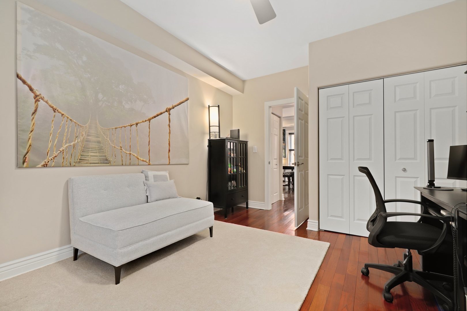 528 West Cornelia Avenue, Unit 2N Chicago, IL 60657 - Photo 11 of 19 a living room with furniture and a wooden floor