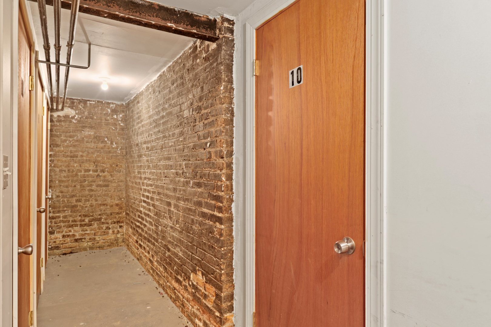 528 West Cornelia Avenue, Unit 2N Chicago, IL 60657 - Photo 18 of 19 a bathroom with a shower and a glass door