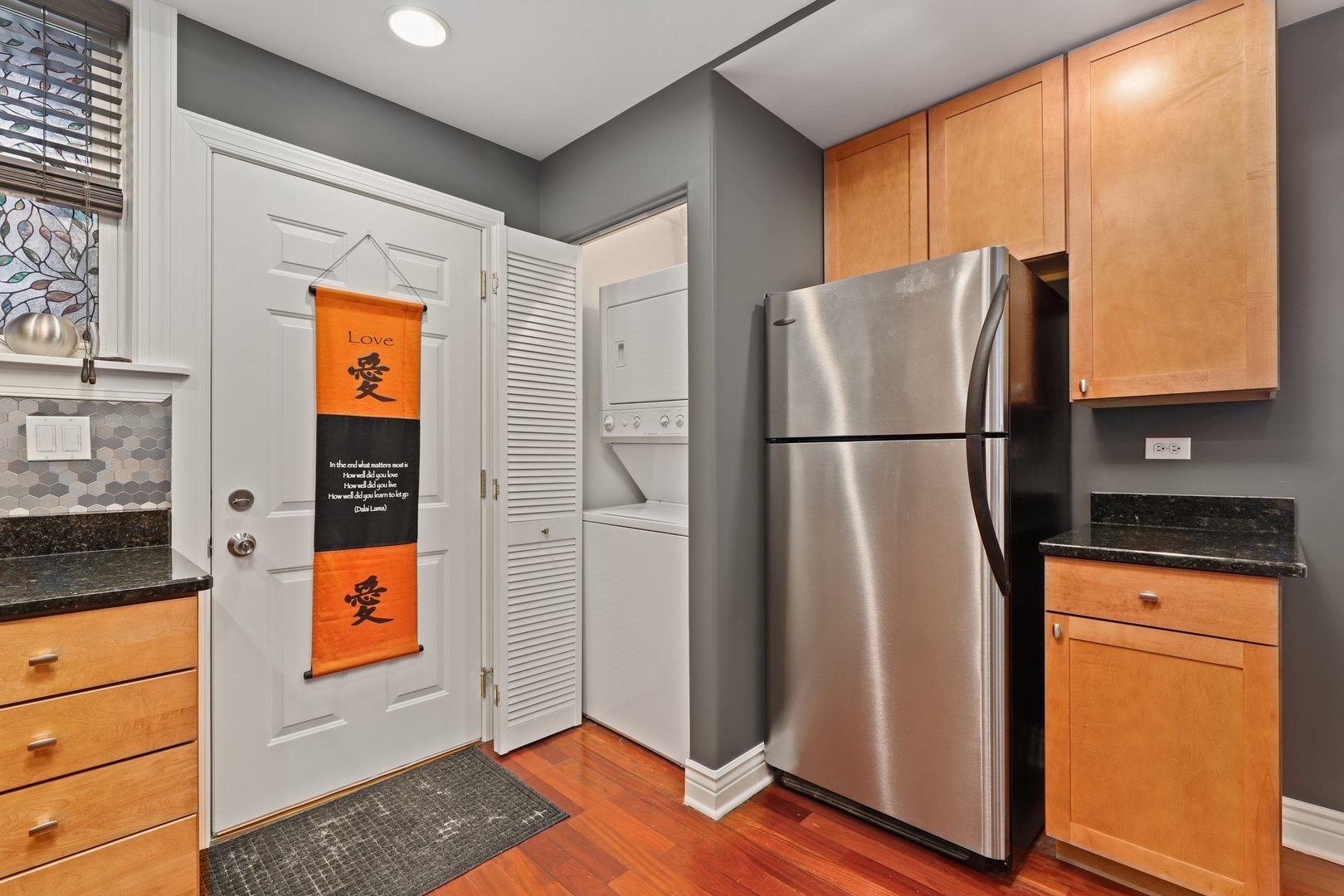 528 West Cornelia Avenue, Unit 2N Chicago, IL 60657 - Photo 9 of 19 a white refrigerator freezer sitting in a kitchen