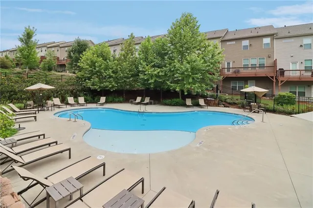 a park bench sitting in the middle of a park