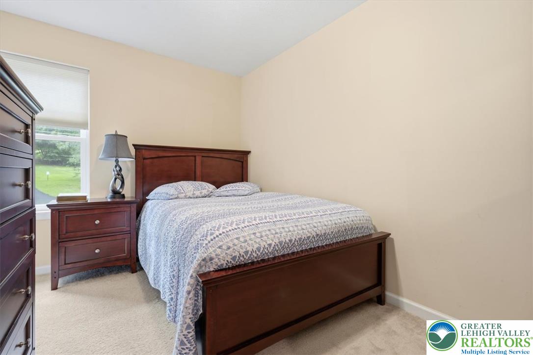 5032 Custard Road Stroudsburg, PA 18360 - Photo 42 of 80 Soft carpeting pairs with neutral walls to create a restful, cozy sleeping space.