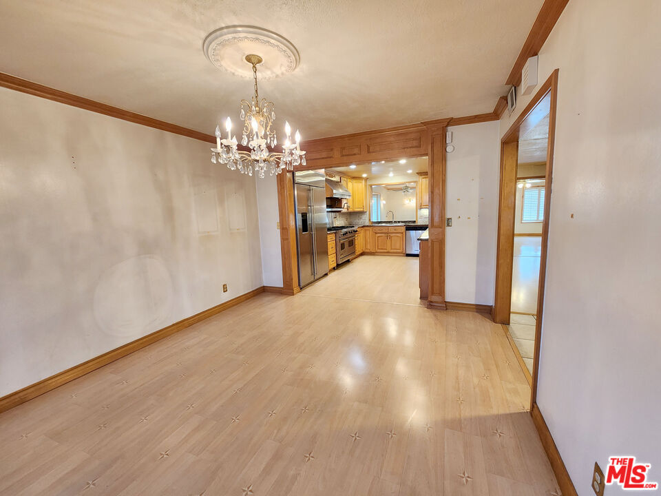 19002 Grandee Avenue Carson, CA 90746 - Photo 11 of 42 a view of a livingroom with furniture and chandelier