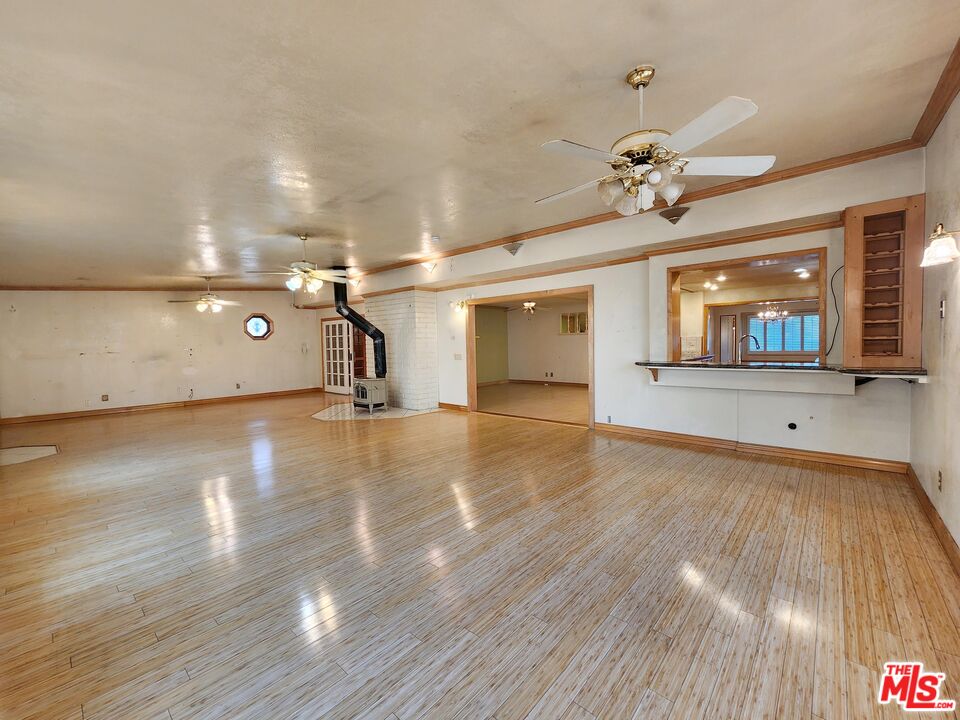 19002 Grandee Avenue Carson, CA 90746 - Photo 16 of 42 a view of a room with wooden floor and cabinet