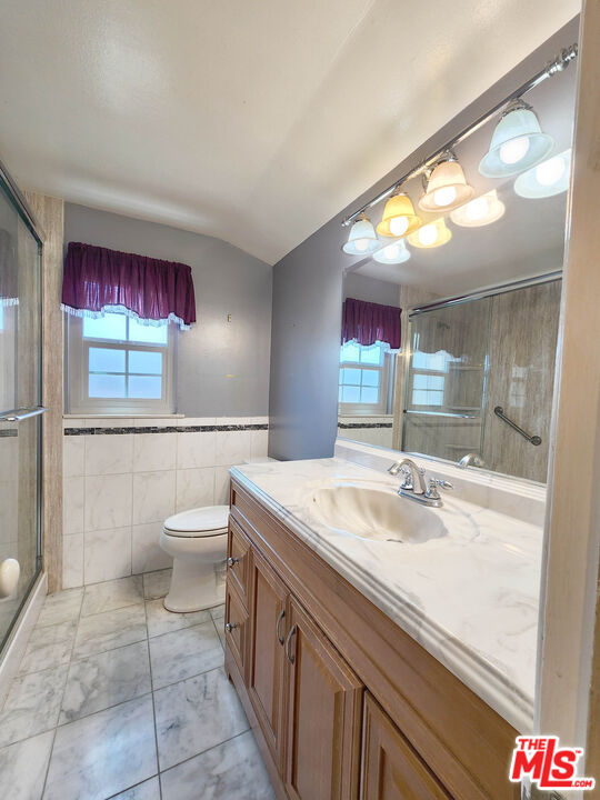 19002 Grandee Avenue Carson, CA 90746 - Photo 26 of 42 a bathroom with a sink and a mirror