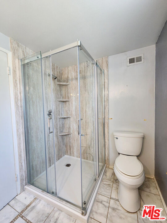19002 Grandee Avenue Carson, CA 90746 - Photo 34 of 42 a bathroom with a shower and a toilet