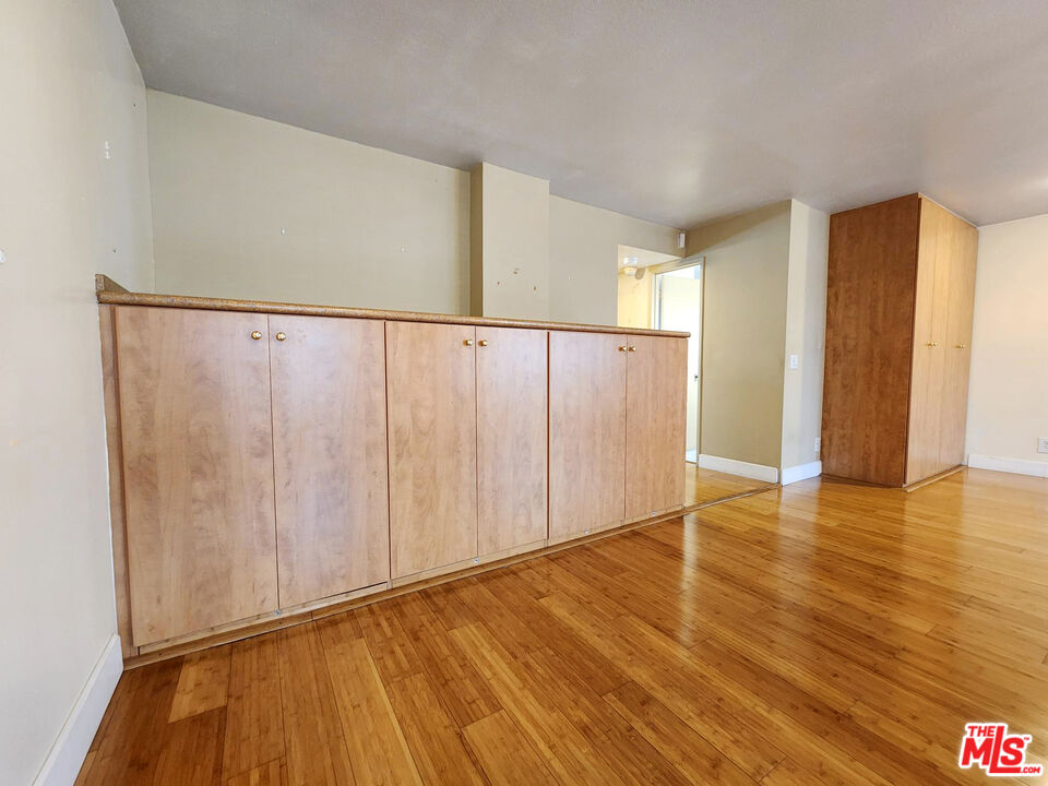 19002 Grandee Avenue Carson, CA 90746 - Photo 38 of 42 a view of an empty room with wooden floor