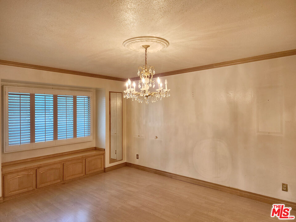 19002 Grandee Avenue Carson, CA 90746 - Photo 9 of 42 a view of an empty room with a window