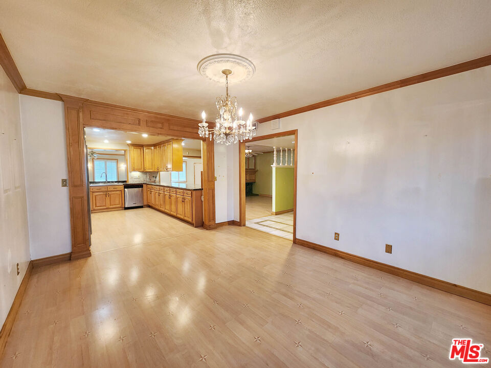 19002 Grandee Avenue Carson, CA 90746 - Photo 10 of 42 a view of a livingroom with a chandelier