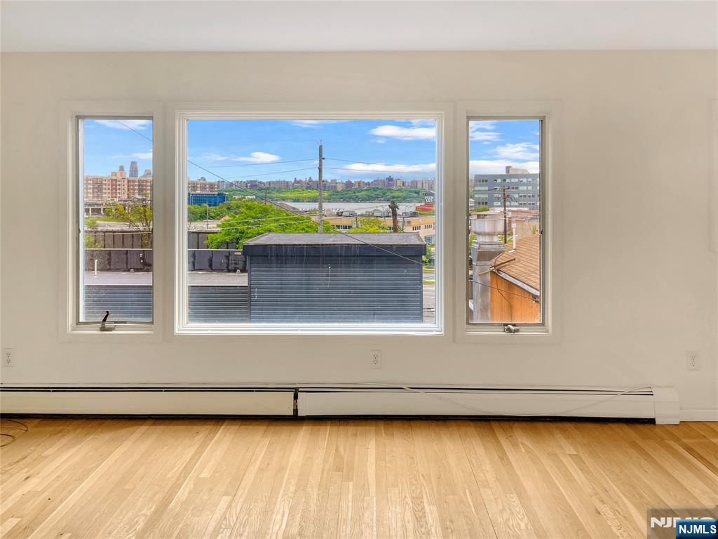 8913 Riverside Place, Unit 3 North Bergen, NJ 07047 - Photo 3 of 17 a view of a building from a window