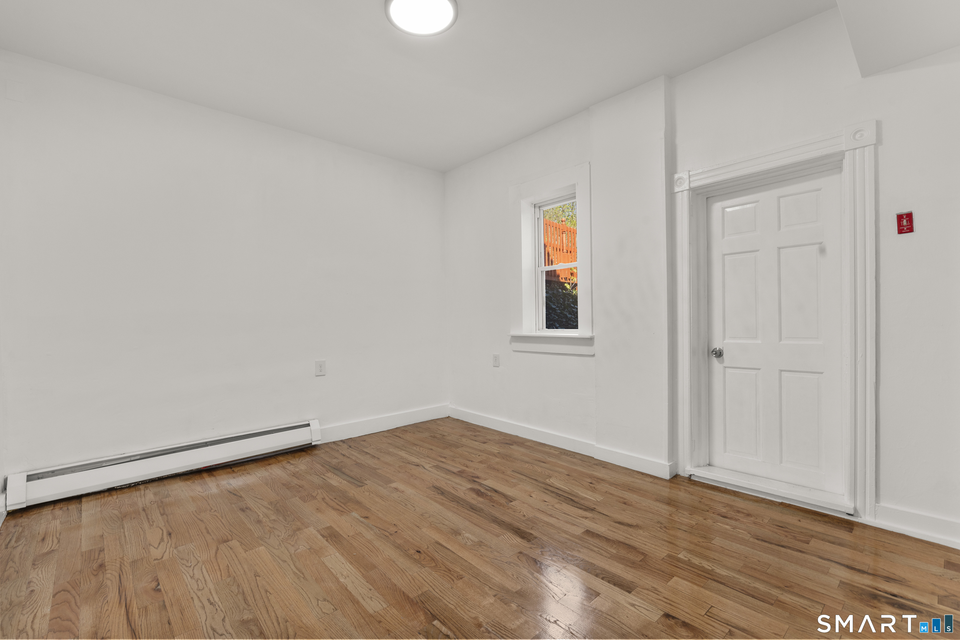 1847 Glasgo Road Griswold, CT 06351 - Photo 11 of 38 wooden floor in an empty room
