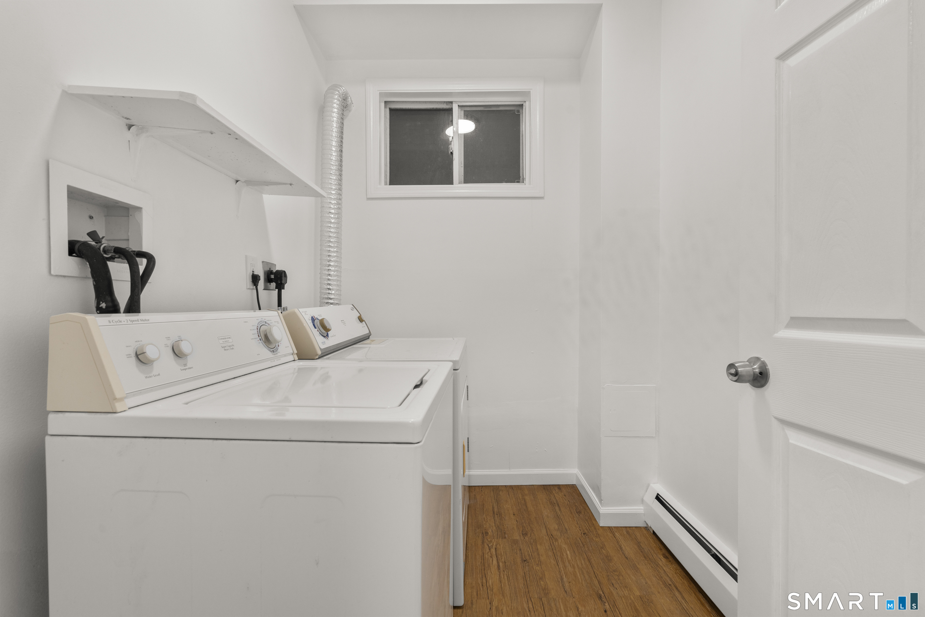 1847 Glasgo Road Griswold, CT 06351 - Photo 14 of 38 a utility room with dryer and washer