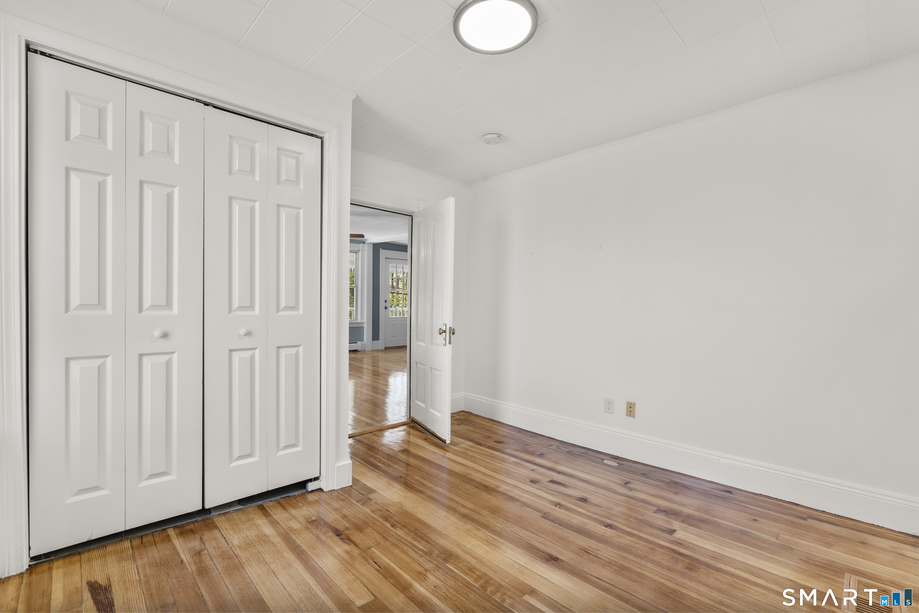 1847 Glasgo Road Griswold, CT 06351 - Photo 21 of 38 a view of a livingroom with wooden floor