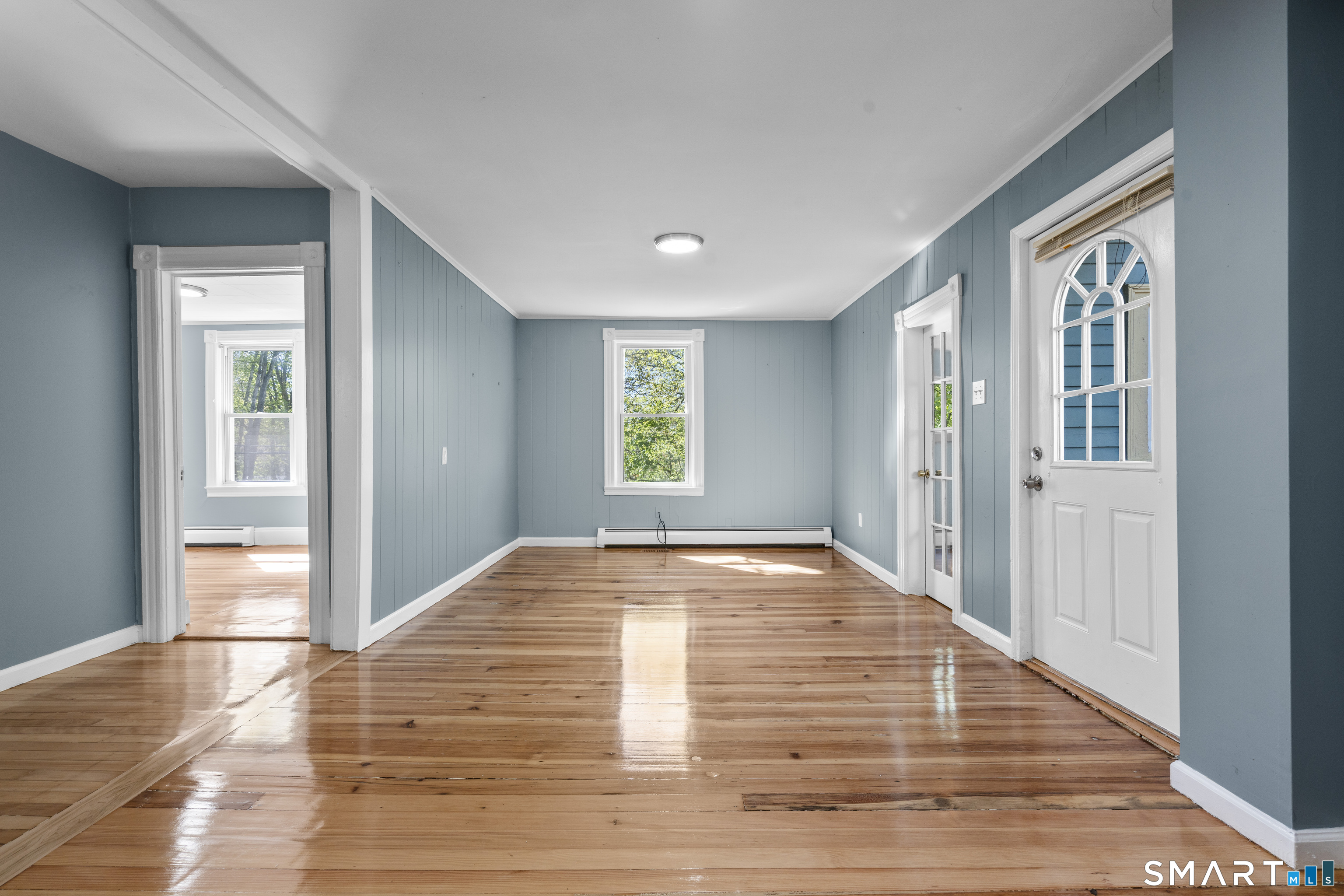 1847 Glasgo Road Griswold, CT 06351 - Photo 28 of 38 a view of an empty room and window