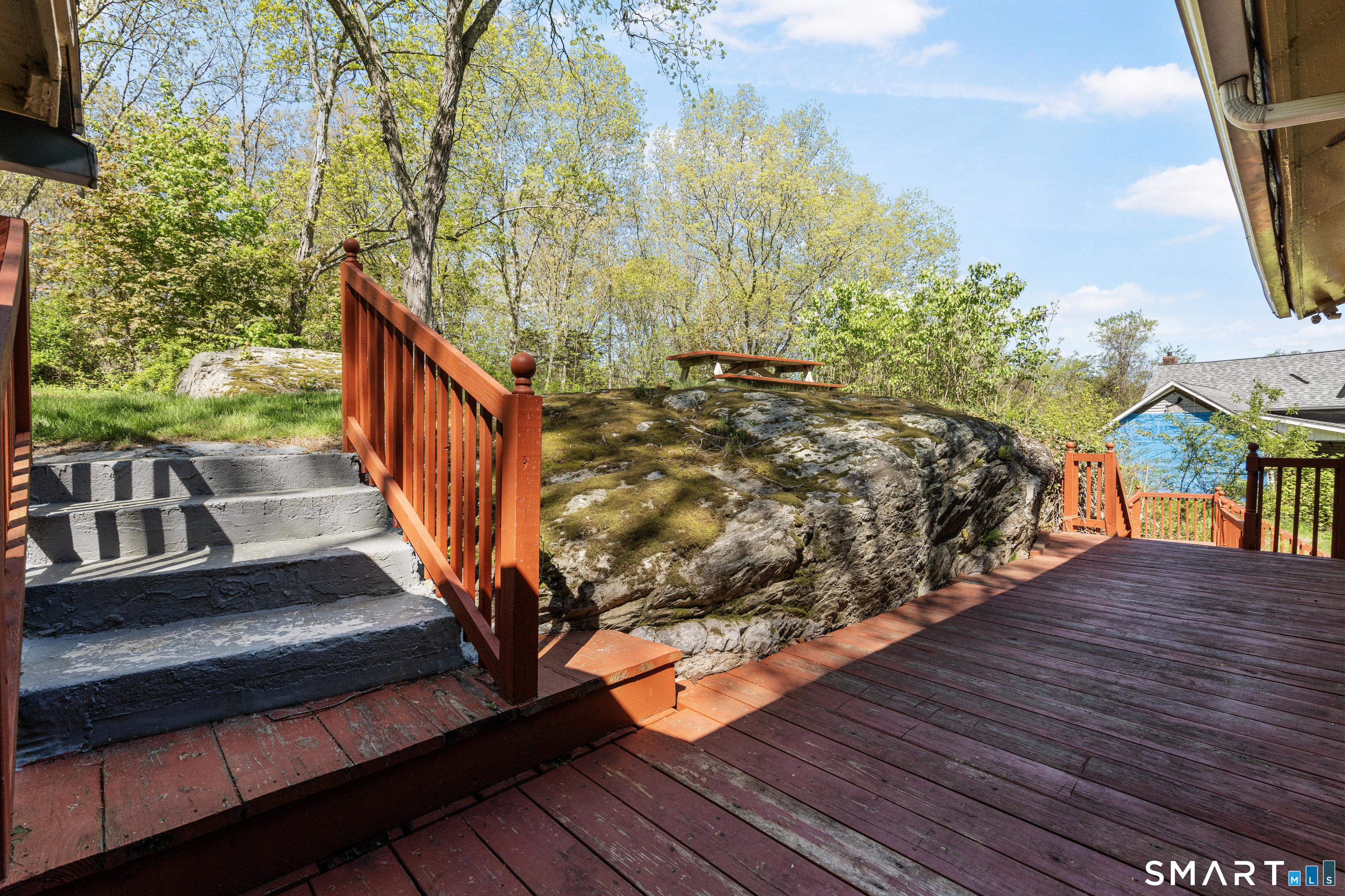 1847 Glasgo Road Griswold, CT 06351 - Photo 31 of 38 a balcony with wooden floor and trees
