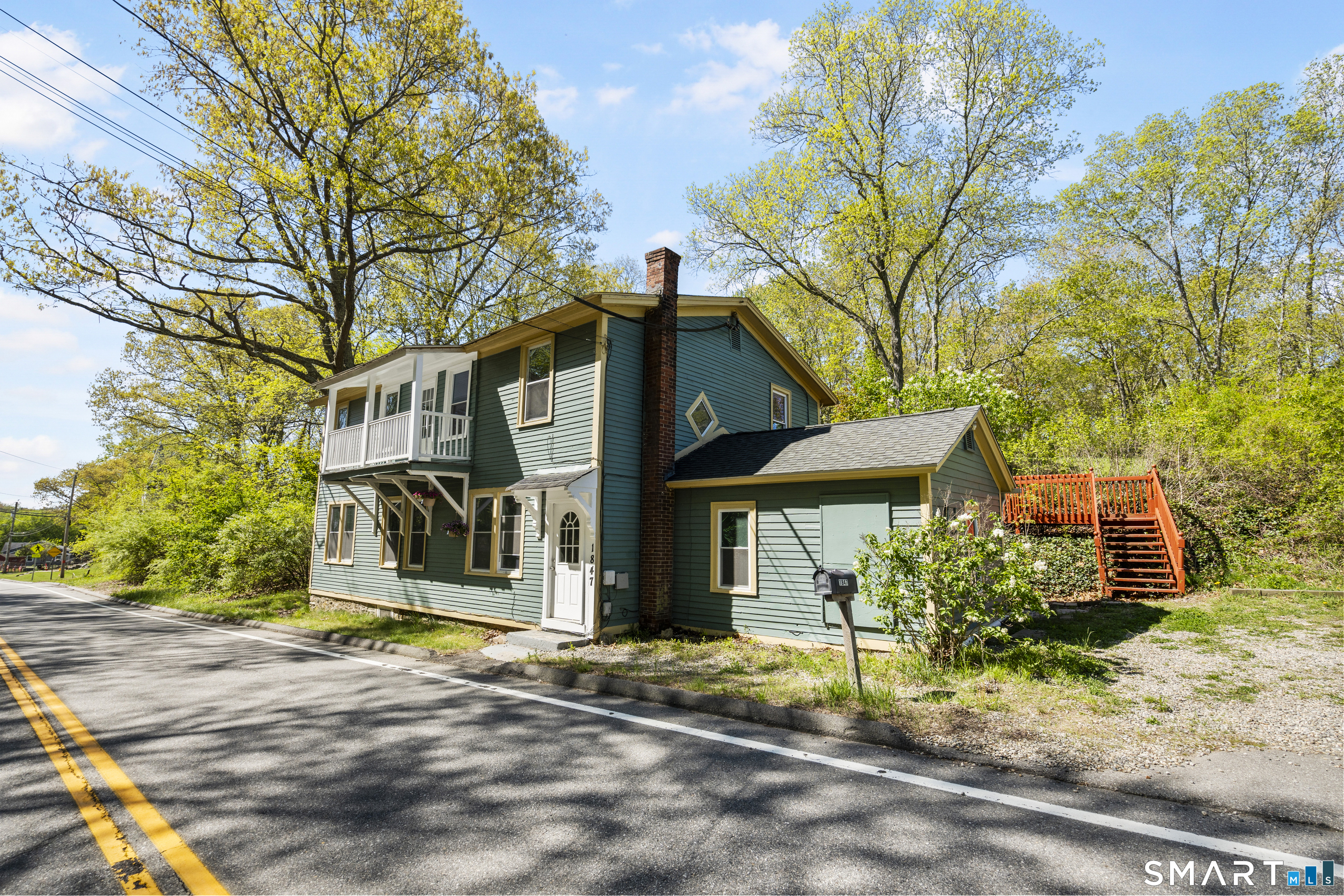 1847 Glasgo Road Griswold, CT 06351 - Photo 37 of 38 a front view of a house with a yard