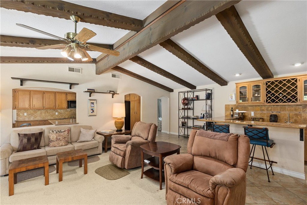 2376 North Vallejo Way Upland, CA 91784 - Photo 11 of 37 a living room with furniture wooden floor and chandelier
