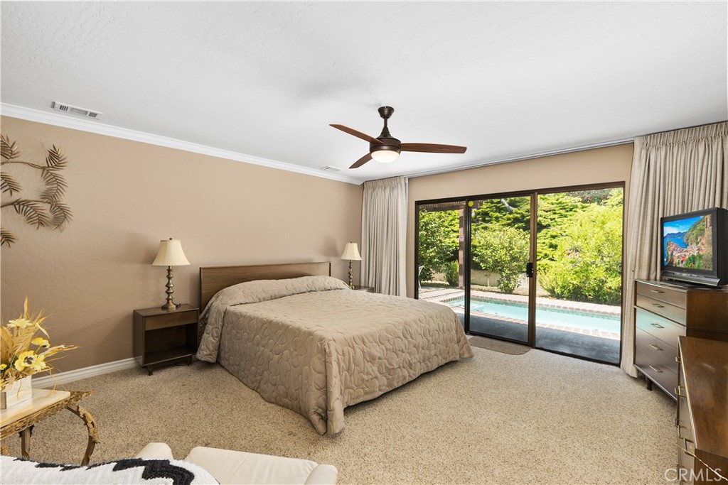 2376 North Vallejo Way Upland, CA 91784 - Photo 18 of 37 a bedroom with a bed and large window