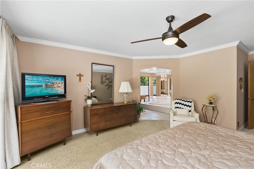 2376 North Vallejo Way Upland, CA 91784 - Photo 19 of 37 a bedroom with furniture and a flat screen tv