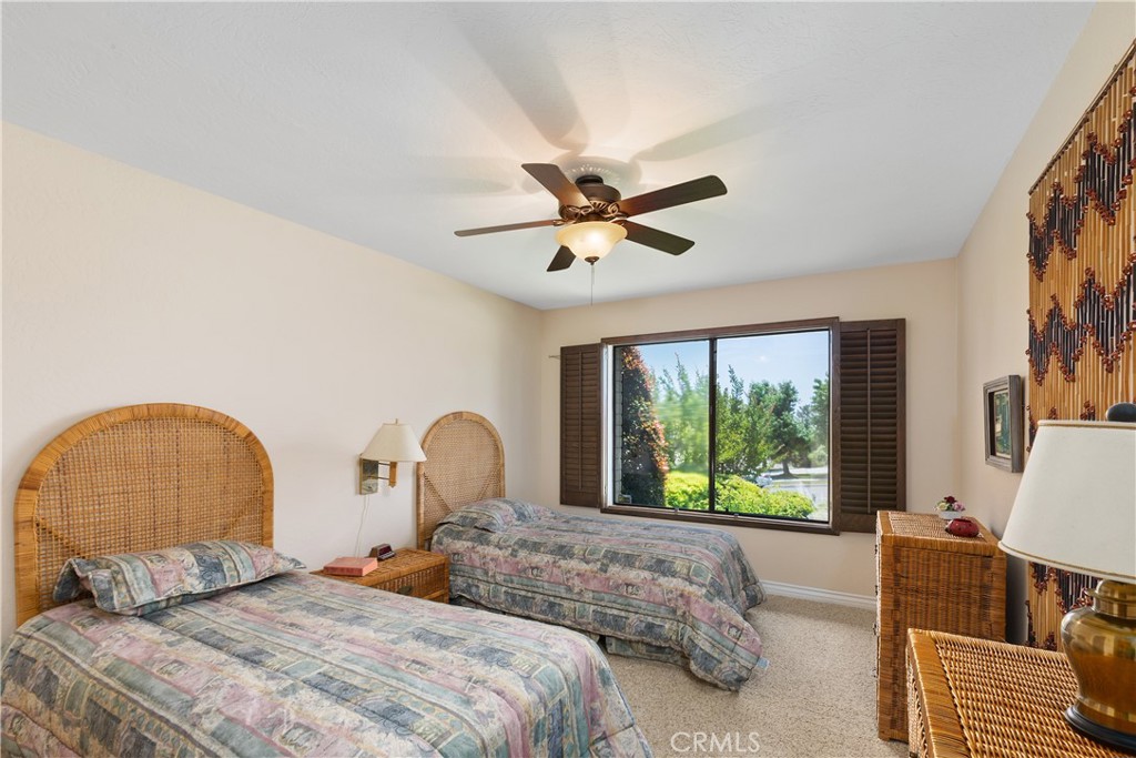 2376 North Vallejo Way Upland, CA 91784 - Photo 24 of 37 a bedroom with a bed and a large window with outer view