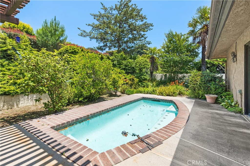 2376 North Vallejo Way Upland, CA 91784 - Photo 29 of 37 a view of a swimming pool with a yard