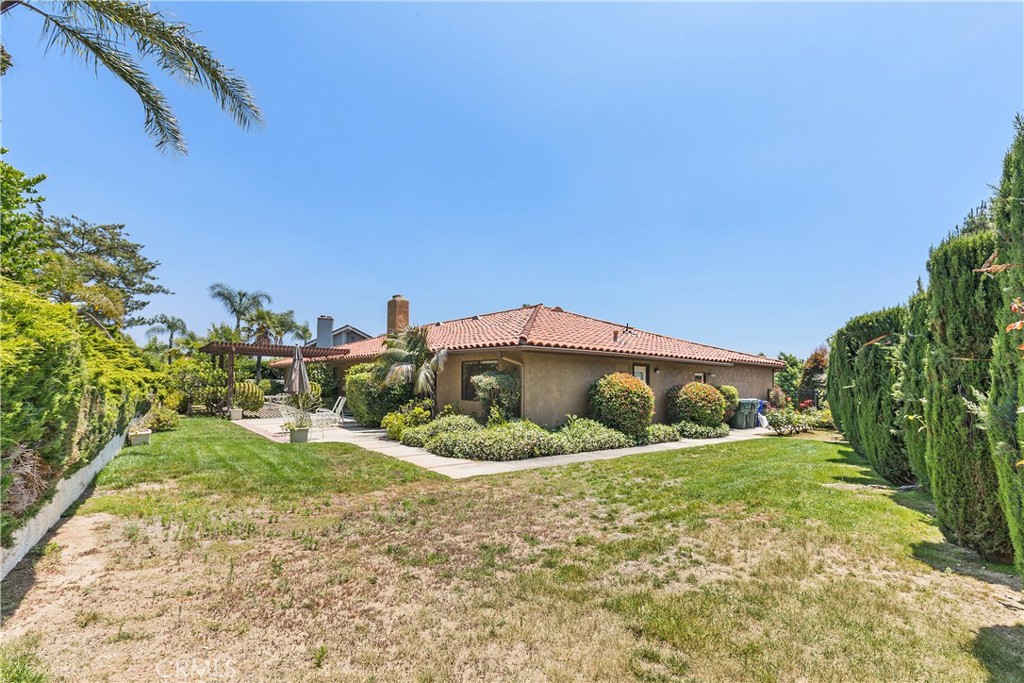 2376 North Vallejo Way Upland, CA 91784 - Photo 33 of 37 a view of a garden with a house