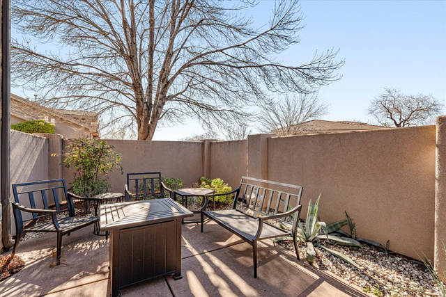 345 North 2450th Street East, Unit 152 St. George, UT 84790 - Photo 4 of 40 Fenced backyard featuring a patio area