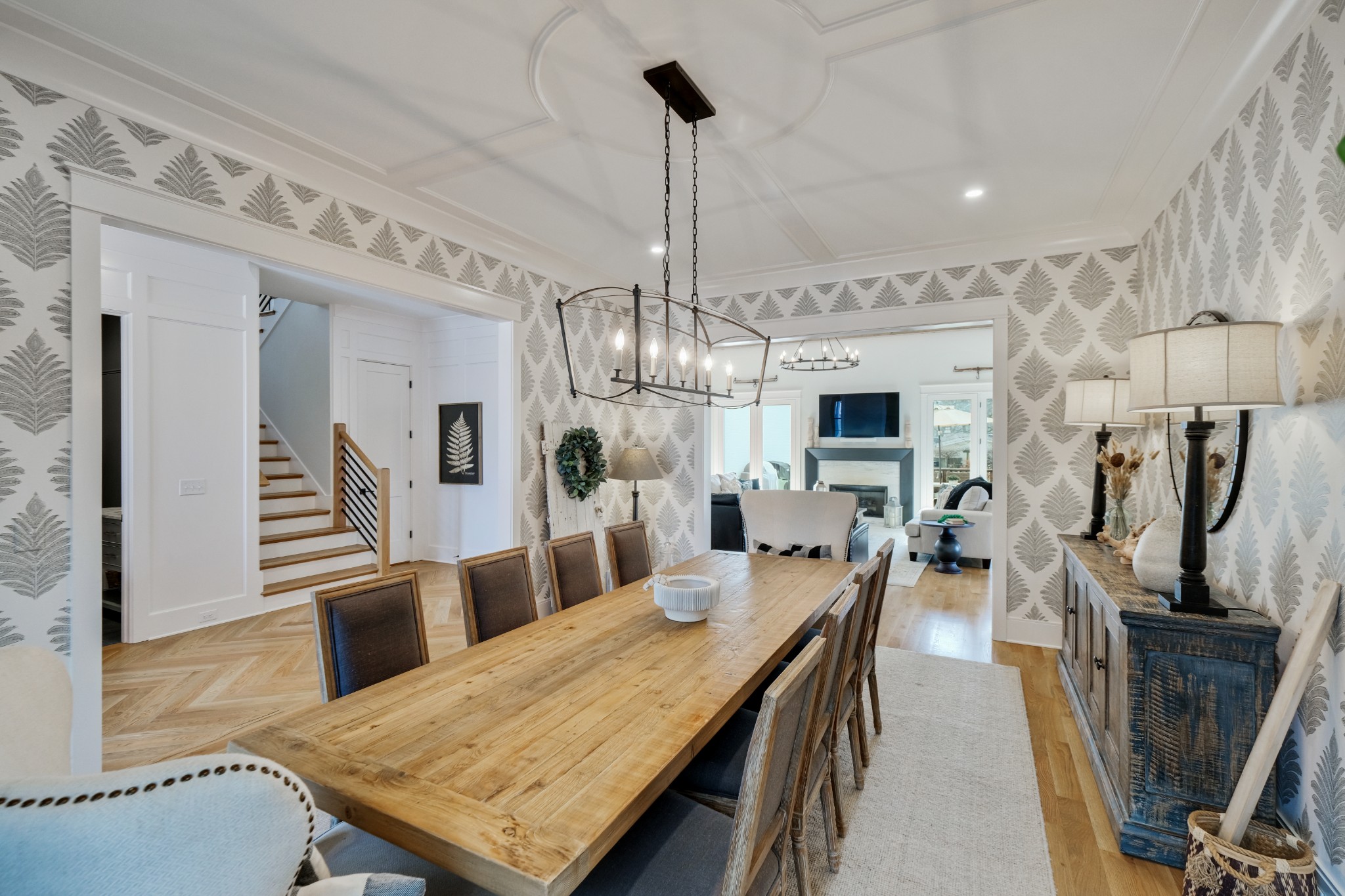 3003 Hobbs Road, Unit B Nashville, TN 37215 - Photo 17 of 70 a view of a dining room with furniture a chandelier and wooden floor