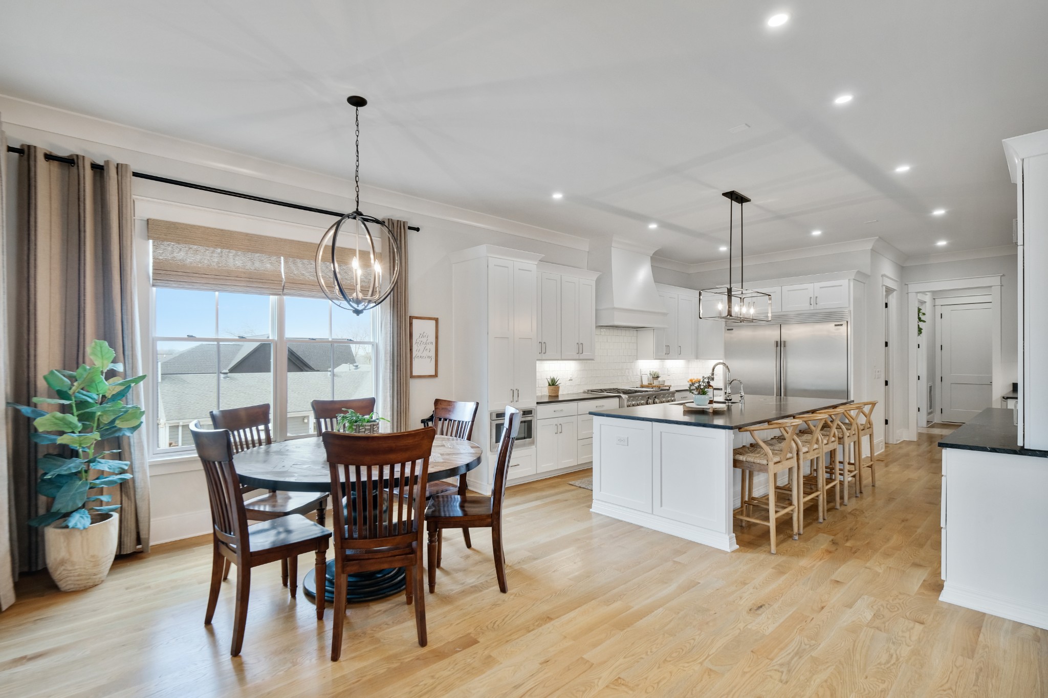 3003 Hobbs Road, Unit B Nashville, TN 37215 - Photo 20 of 70 a view of a dining room with furniture window and wooden floor