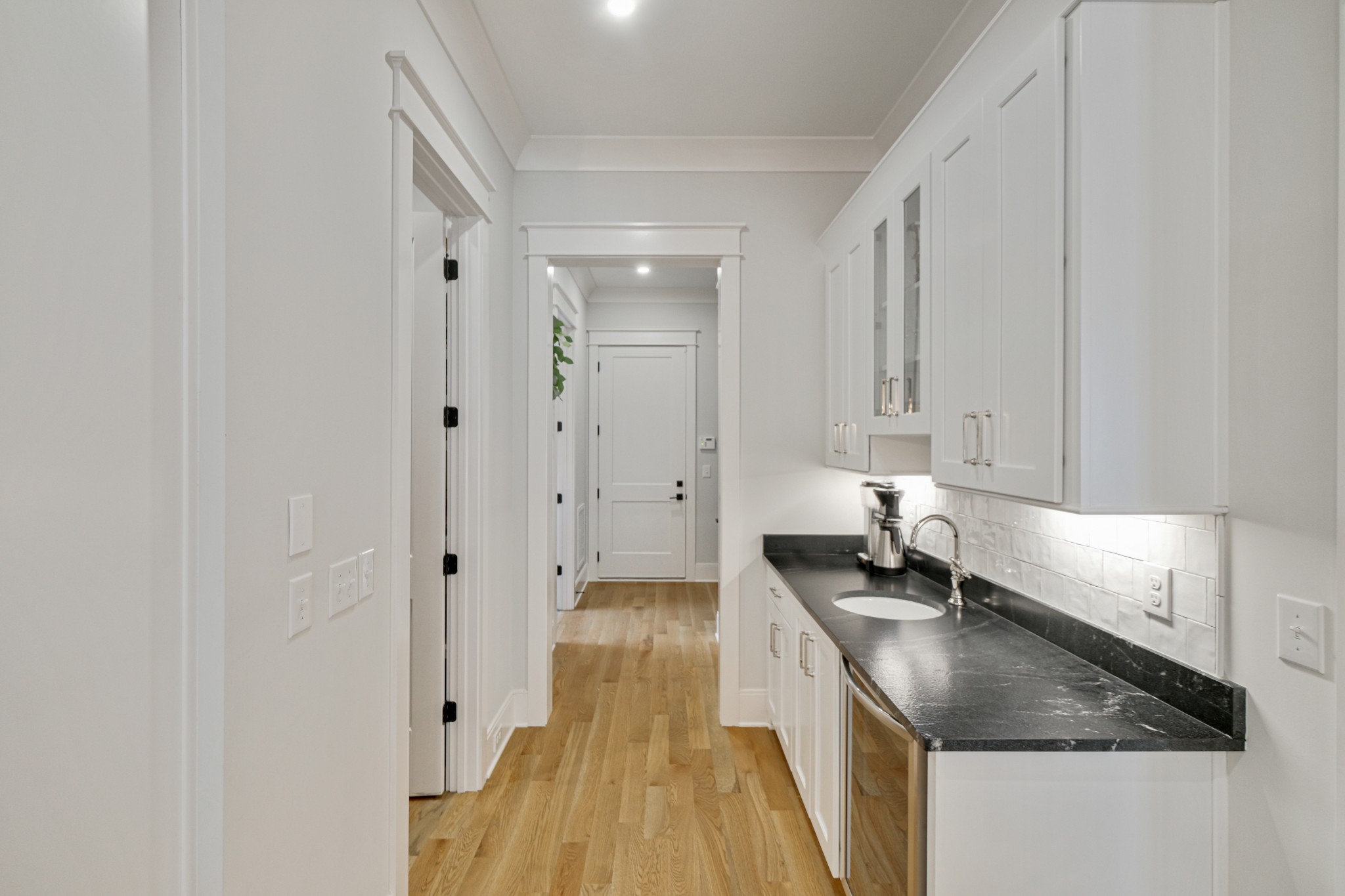 3003 Hobbs Road, Unit B Nashville, TN 37215 - Photo 26 of 70 a kitchen with granite countertop a sink stove and cabinets