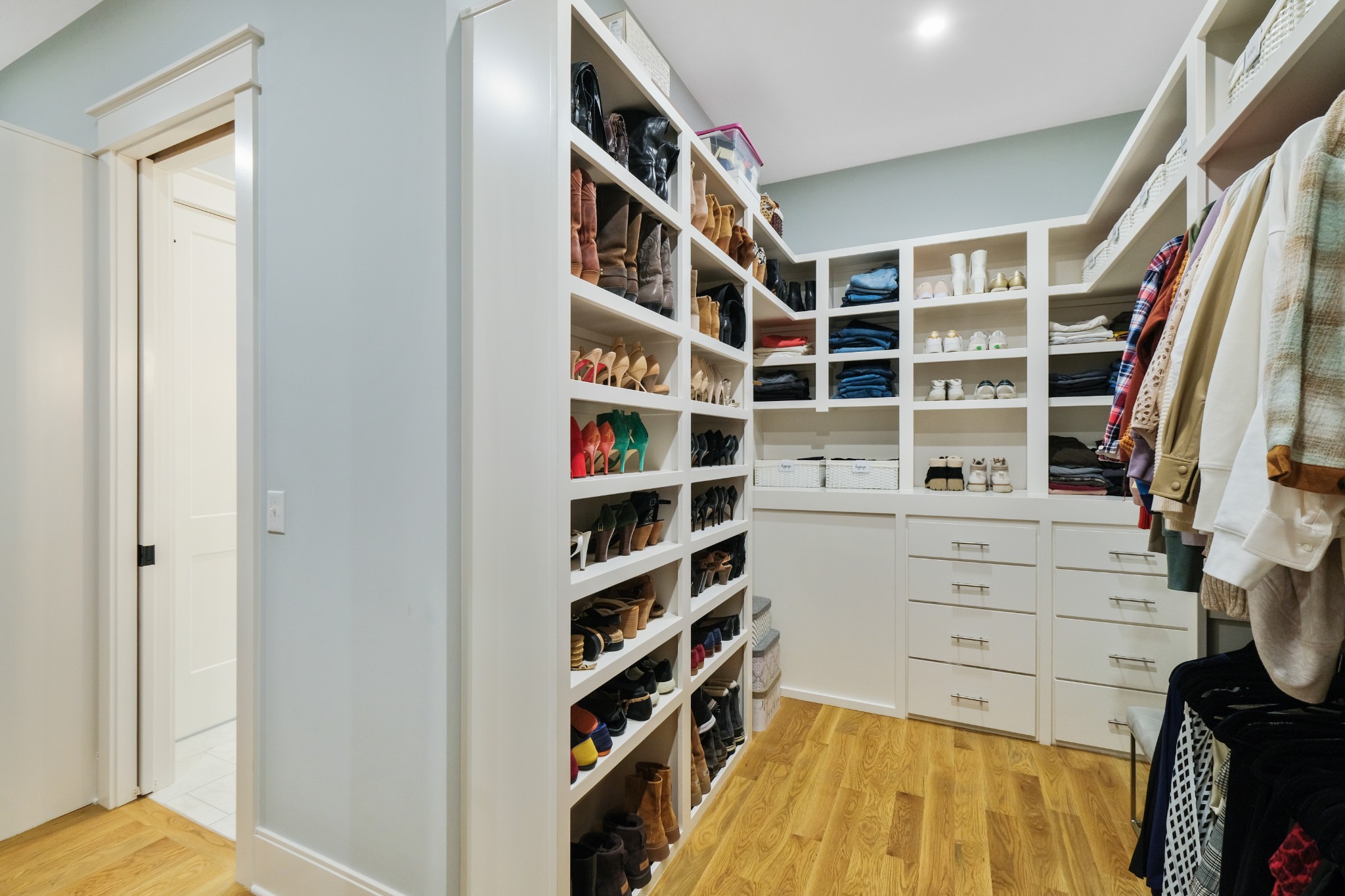 3003 Hobbs Road, Unit B Nashville, TN 37215 - Photo 36 of 70 a view of walk in closet with clothes and shoes