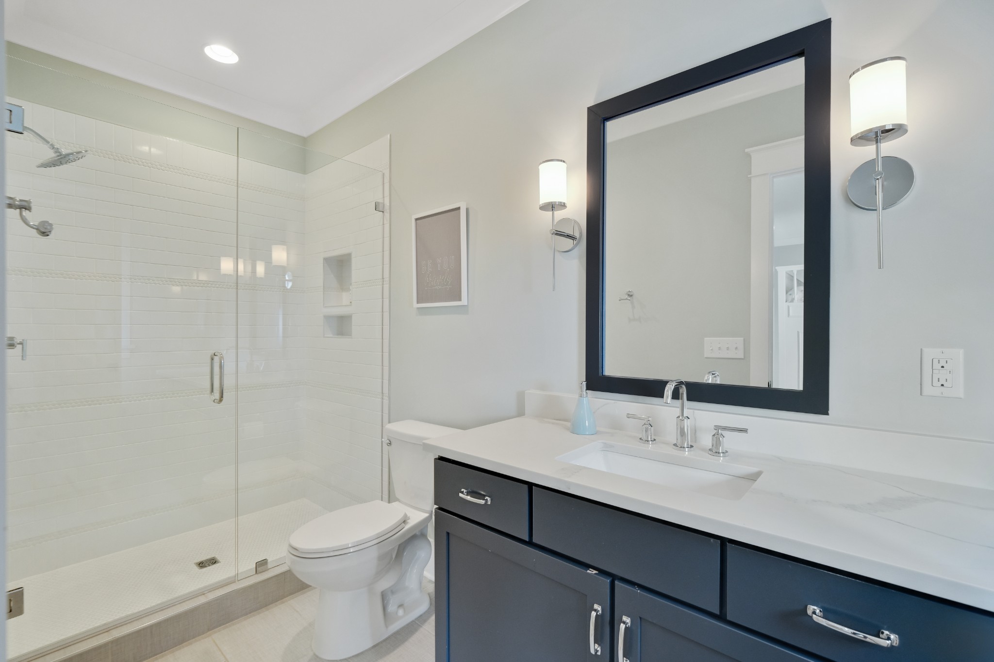 3003 Hobbs Road, Unit B Nashville, TN 37215 - Photo 41 of 70 a bathroom with a sink a toilet and shower