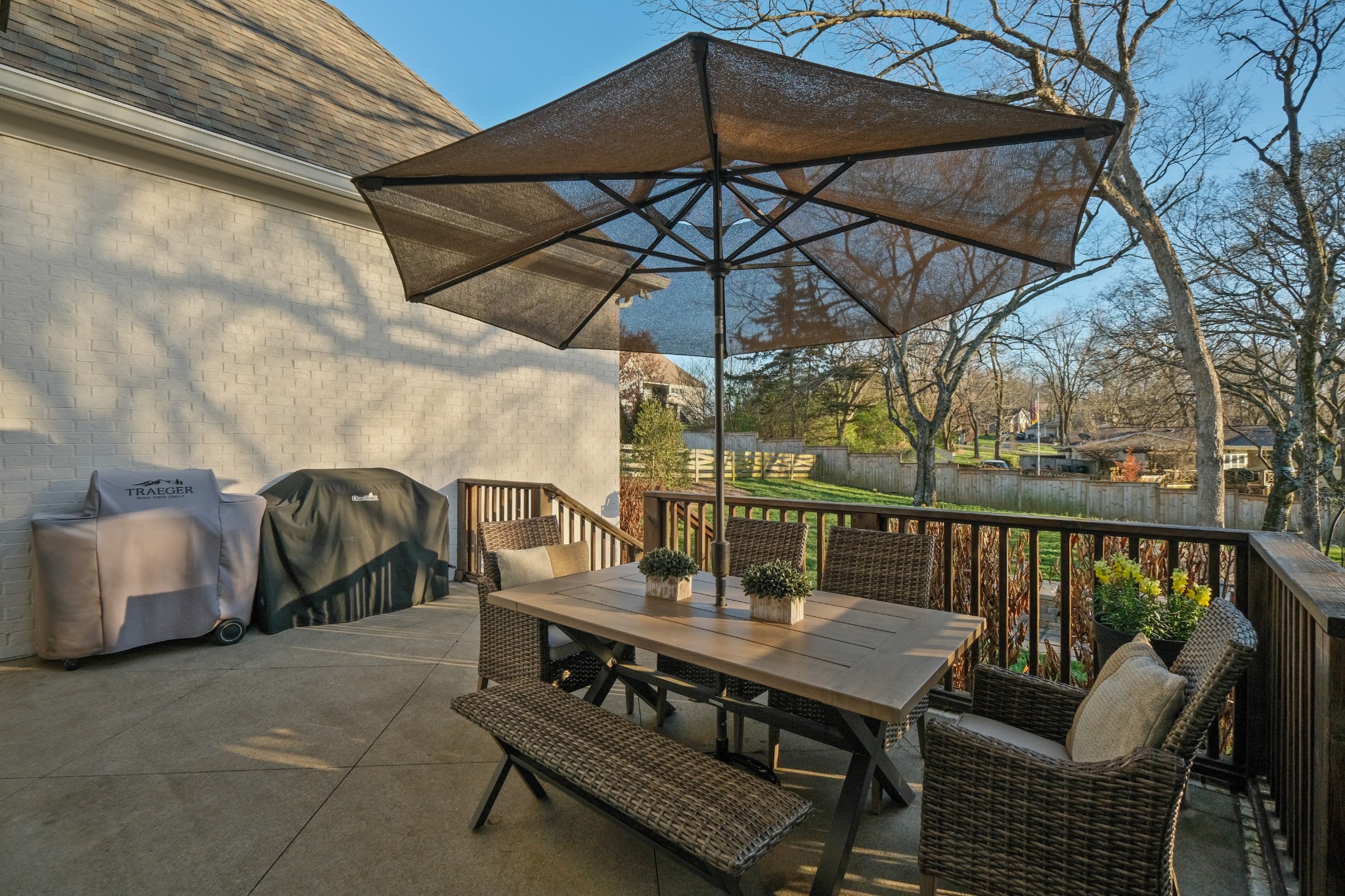 3003 Hobbs Road, Unit B Nashville, TN 37215 - Photo 63 of 70 a view of a patio with a table and chairs under an umbrella