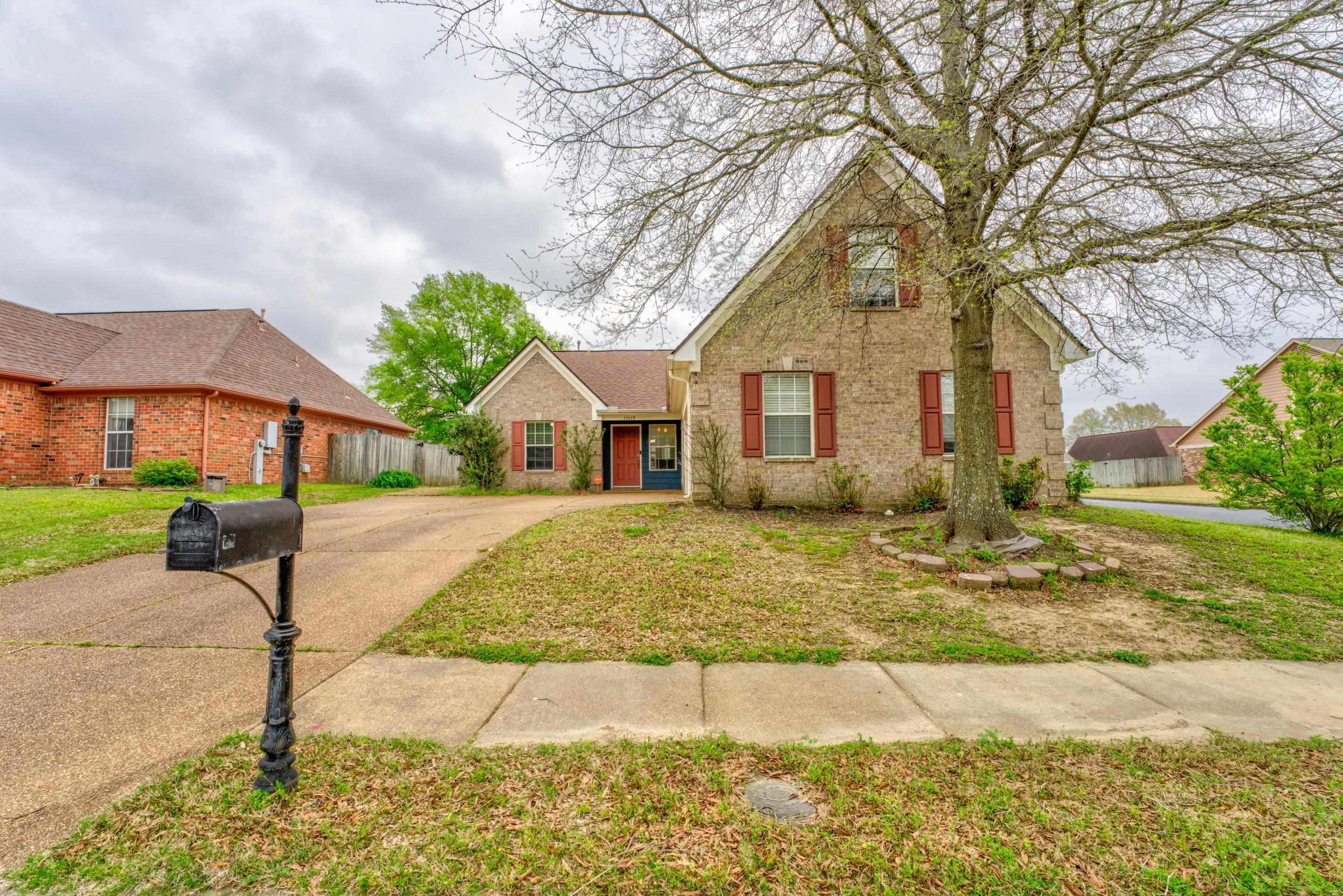 11668 Millwind Drive Arlington, TN 38002 - Photo 18 of 22 a front view of house with yard