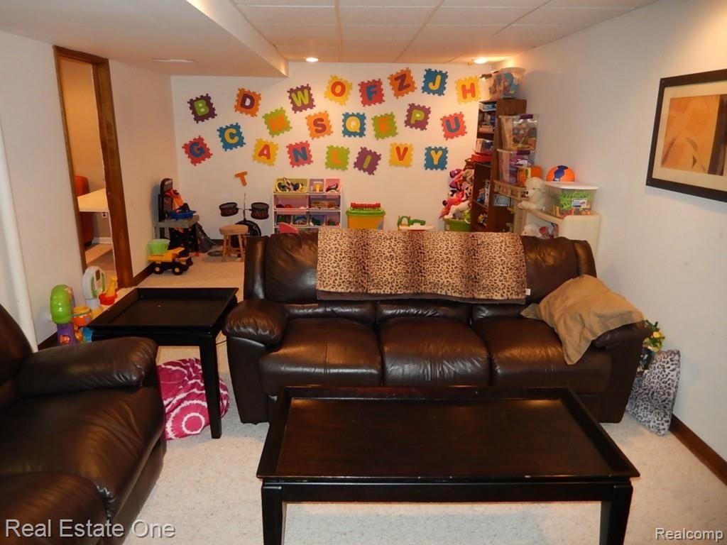 3211 Newton Road Commerce Township, MI 48382 - Photo 15 of 23 Finished Basement Family Room View 2
